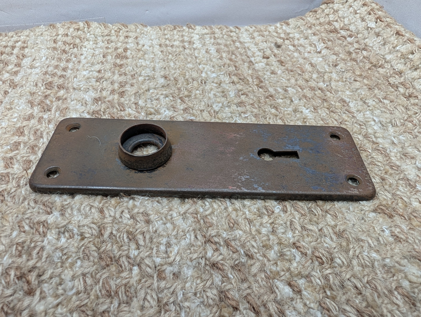 1 13/16" x 5 11/16" Antique Stamped Steel Door Knob Plate