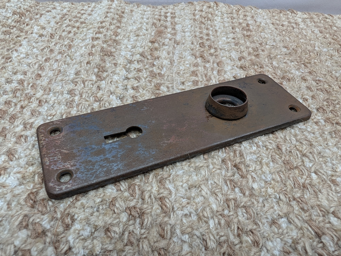 1 13/16" x 5 11/16" Antique Stamped Steel Door Knob Plate
