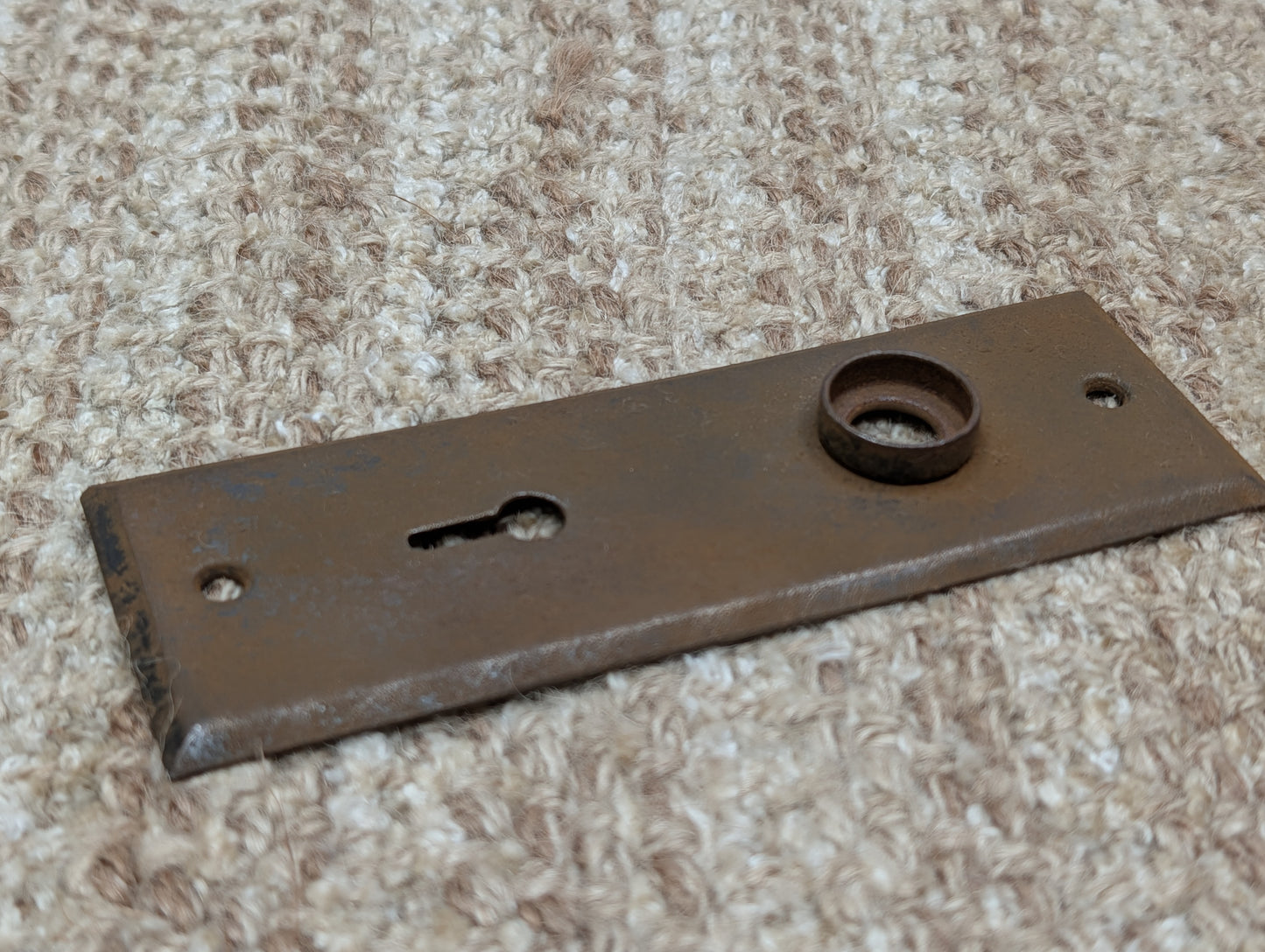 1 13/16" x 5 7/8" Antique Stamped Steel Door Knob Plate