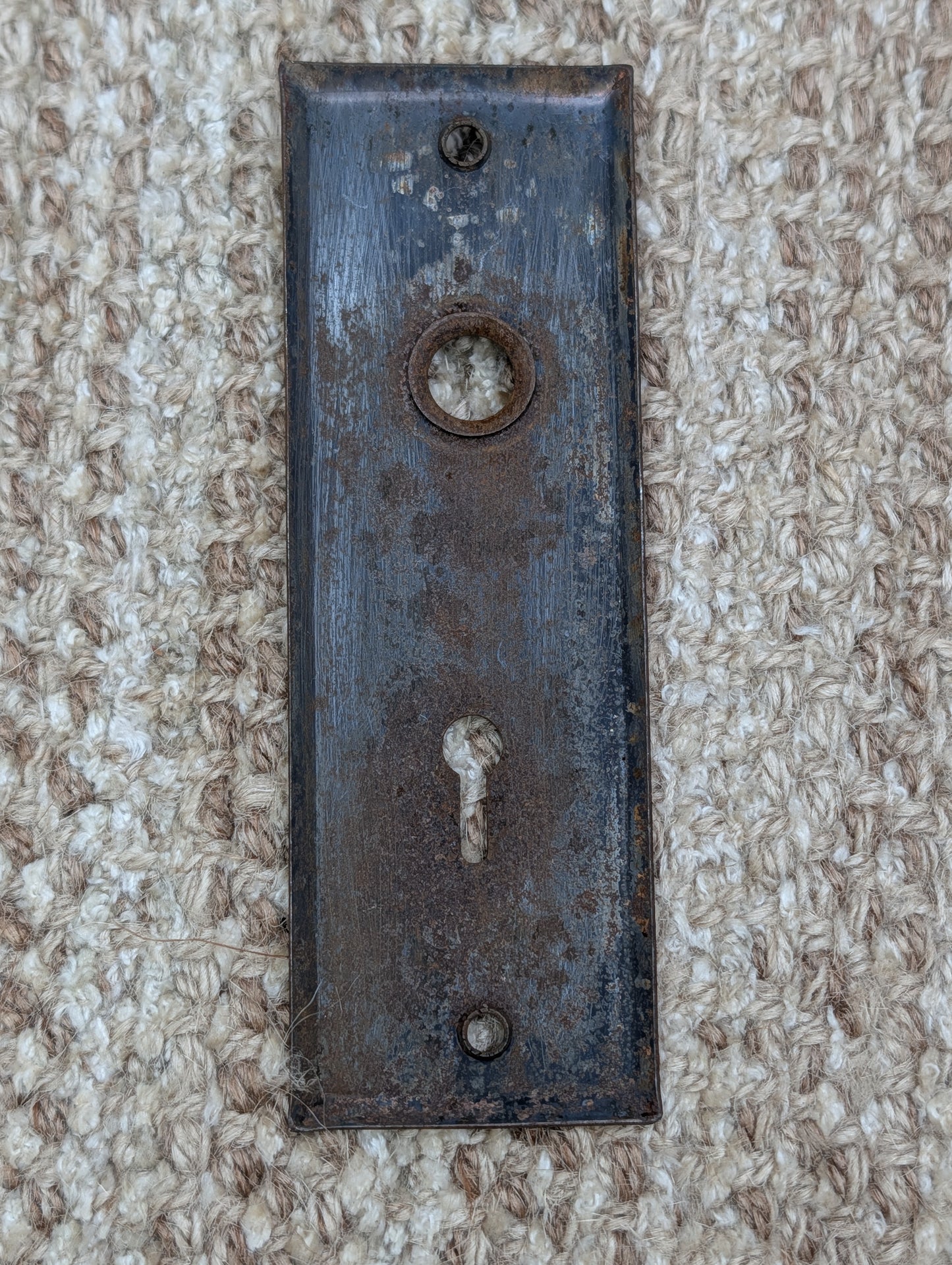 1 13/16" x 5 7/8" Antique Stamped Steel Door Knob Plate