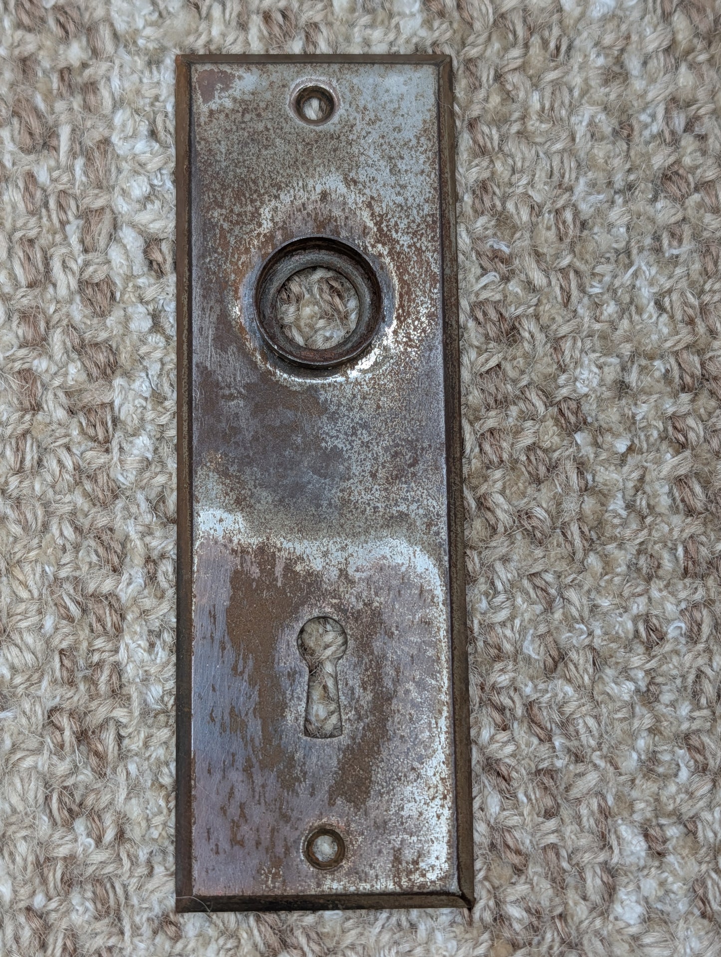 1 13/16" x 5 7/16" Antique Stamped Steel Door Knob Plate