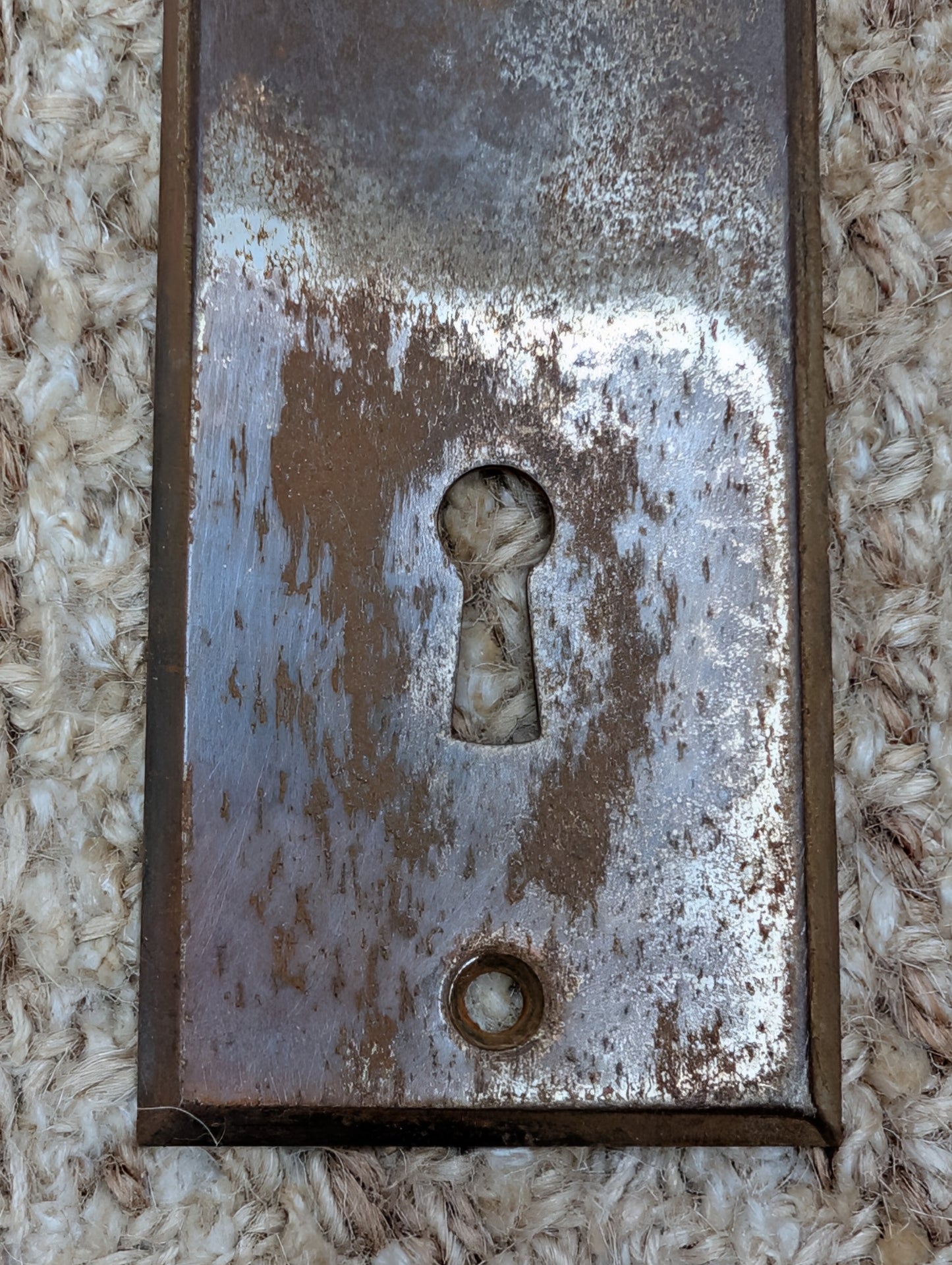 1 13/16" x 5 7/16" Antique Stamped Steel Door Knob Plate