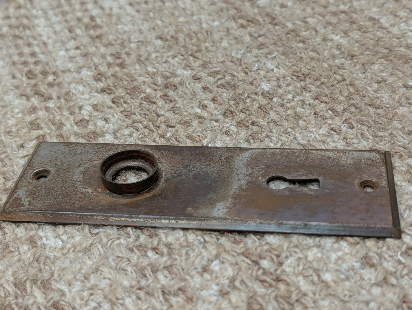 1 13/16" x 5 7/16" Antique Stamped Steel Door Knob Plate