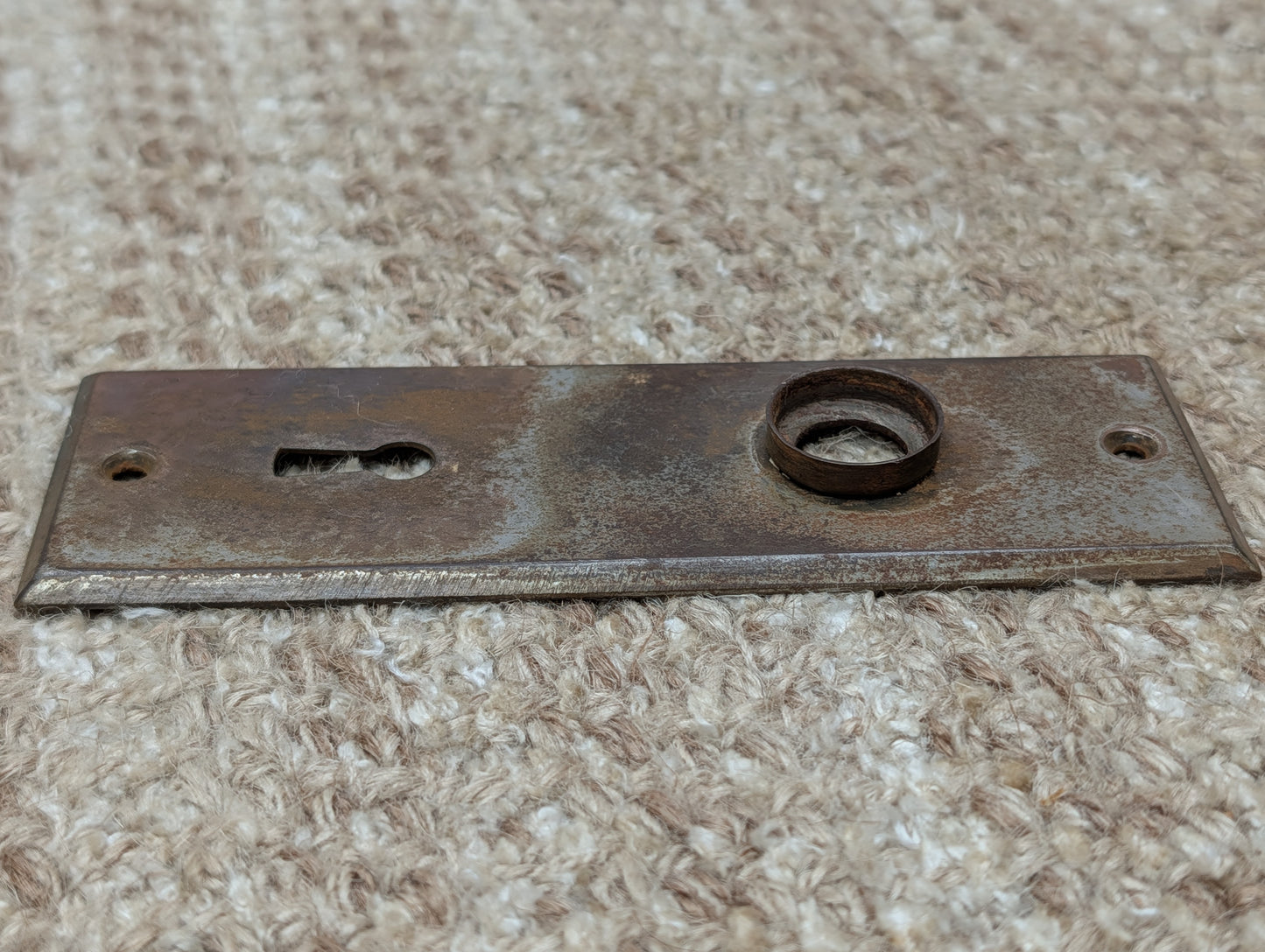 1 13/16" x 5 7/16" Antique Stamped Steel Door Knob Plate