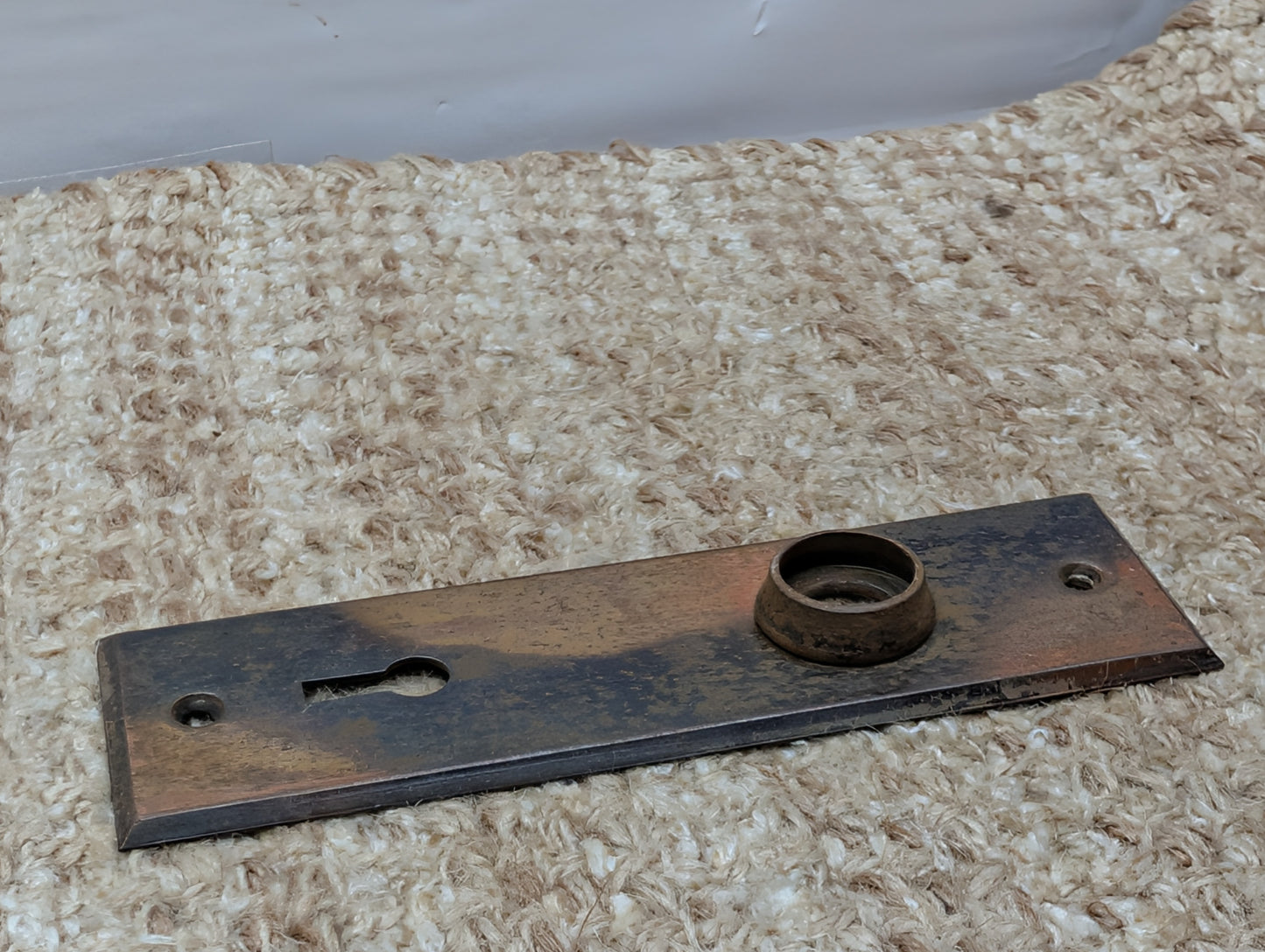 1 5/8" x 5 1/2" Antique Stamped Steel Door Knob Plate