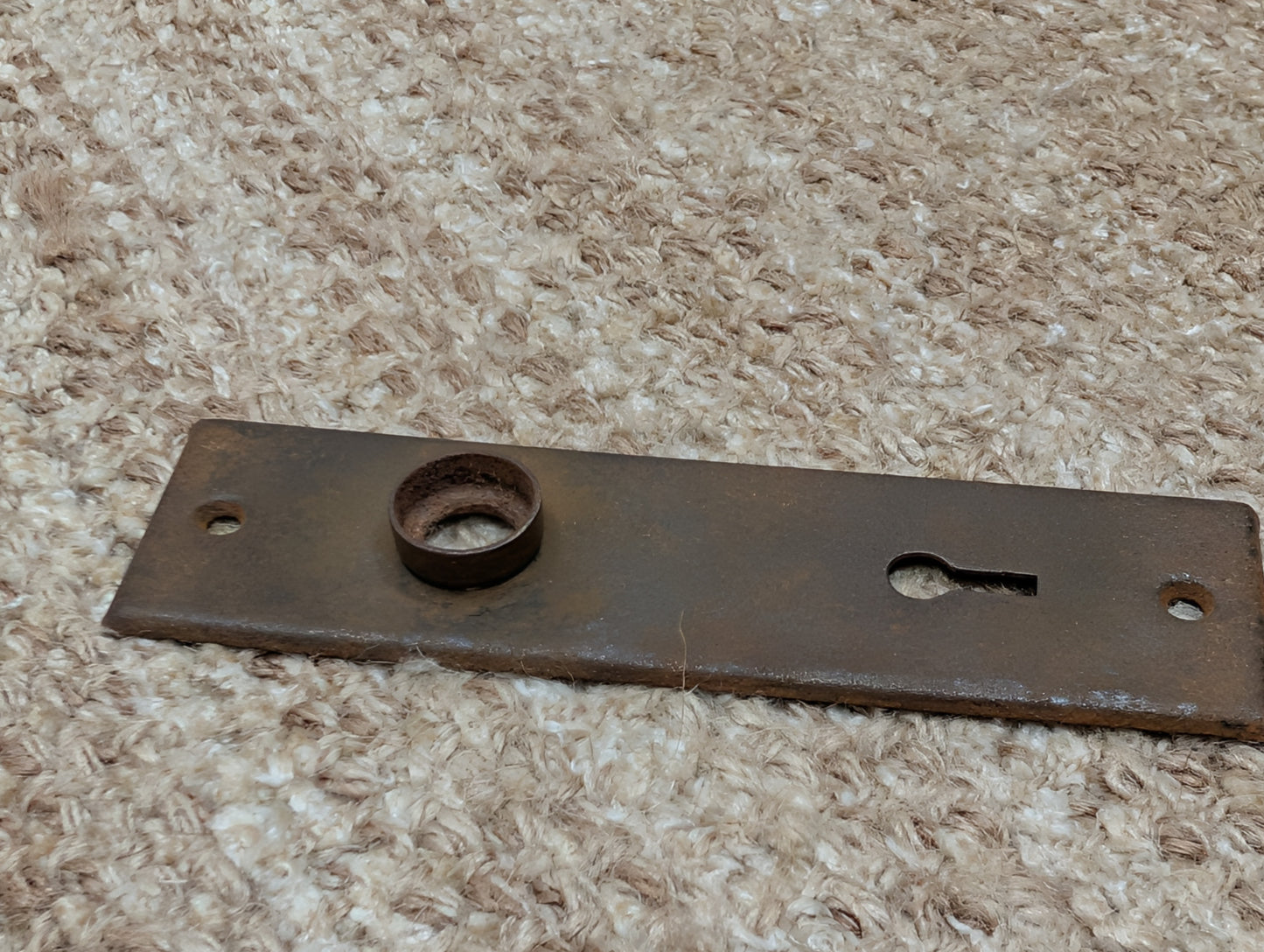 1 9/16" x 5 7/16" Antique Stamped Steel Door Knob Plate