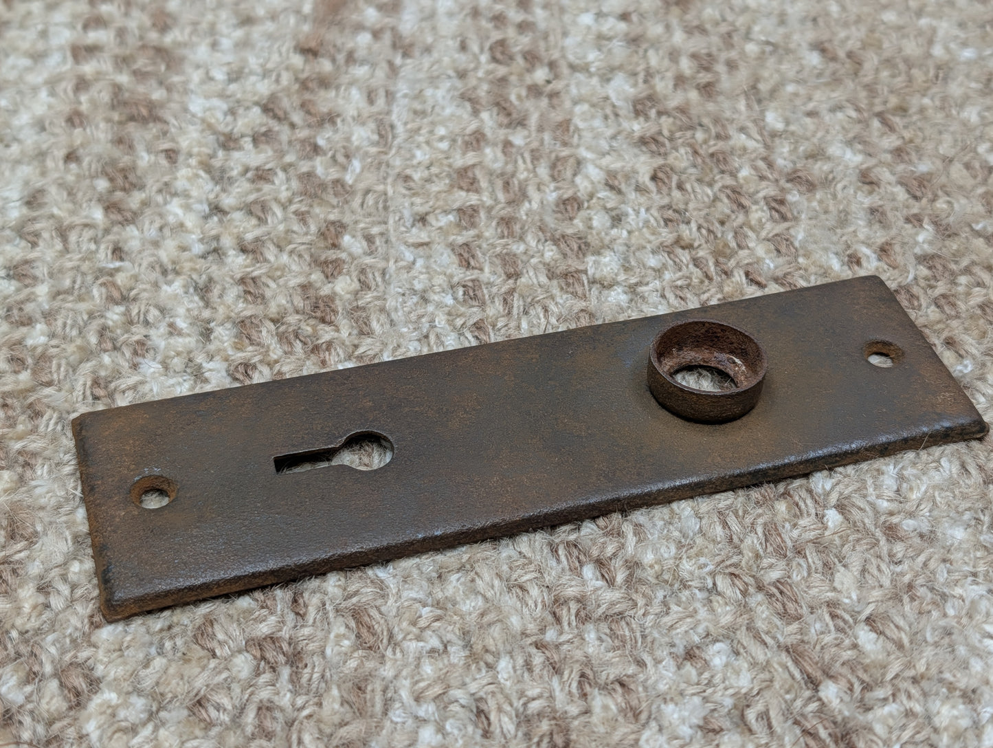1 9/16" x 5 7/16" Antique Stamped Steel Door Knob Plate
