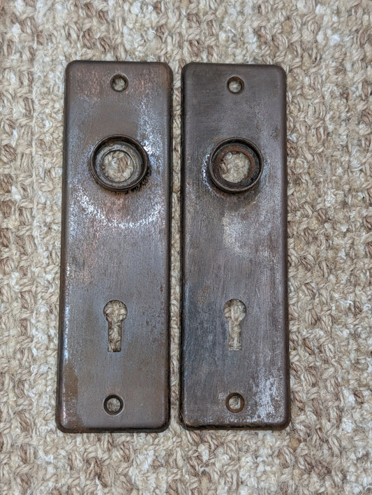 Pair 1 5/8" x 5 1/2" Antique Stamped Steel Door Knob Plates
