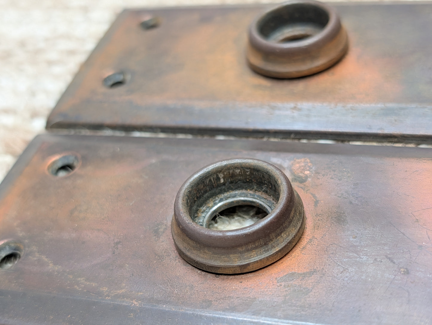 Pair 2 1/4" x 7" Antique Japanned Stamped Steel Door Knob Plates