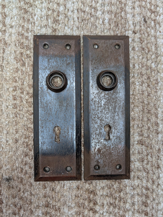 Pair 2 1/4" x 7" Antique Japanned Stamped Steel Door Knob Plates