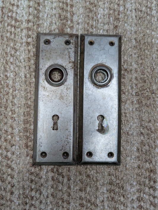 Pair Of 2 1/4" x 7"  Antique Stamped Steel Door Knob Plates
