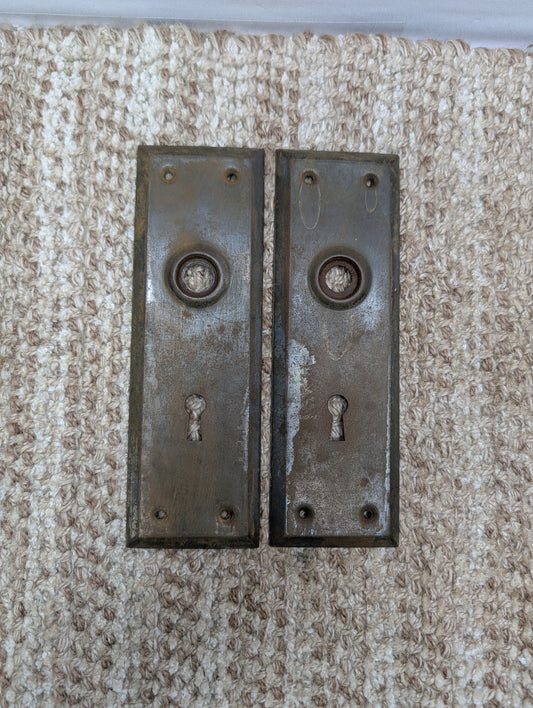 Pair 2 1/4" x 7" Antique Stamped Steel Door Knob Plates