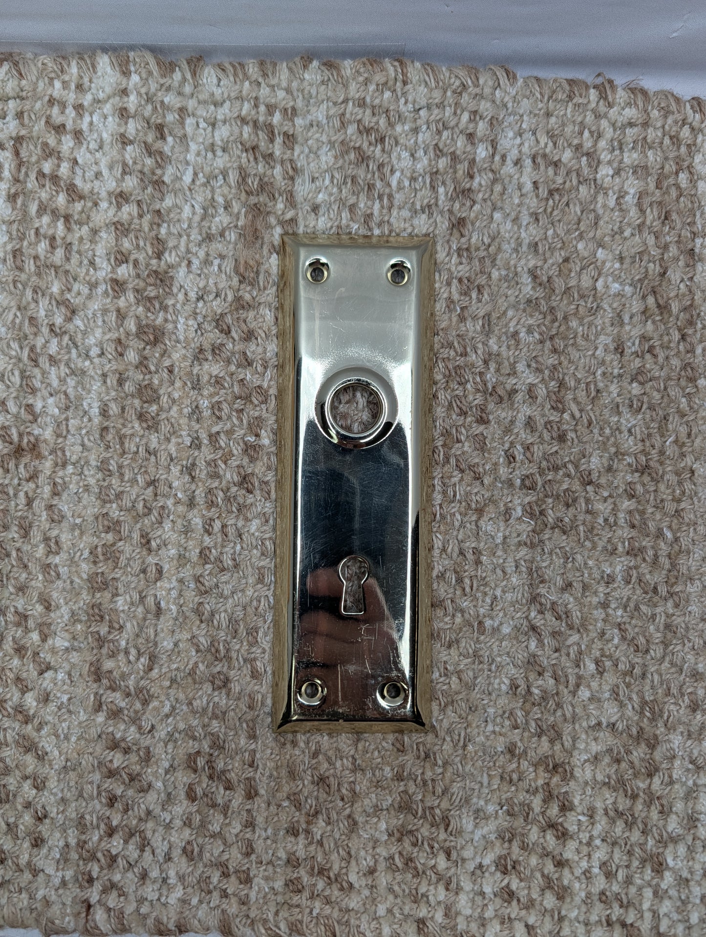 2 1/4" x 7 1/16" Antique Brass Plated Steel Door Knob Plate