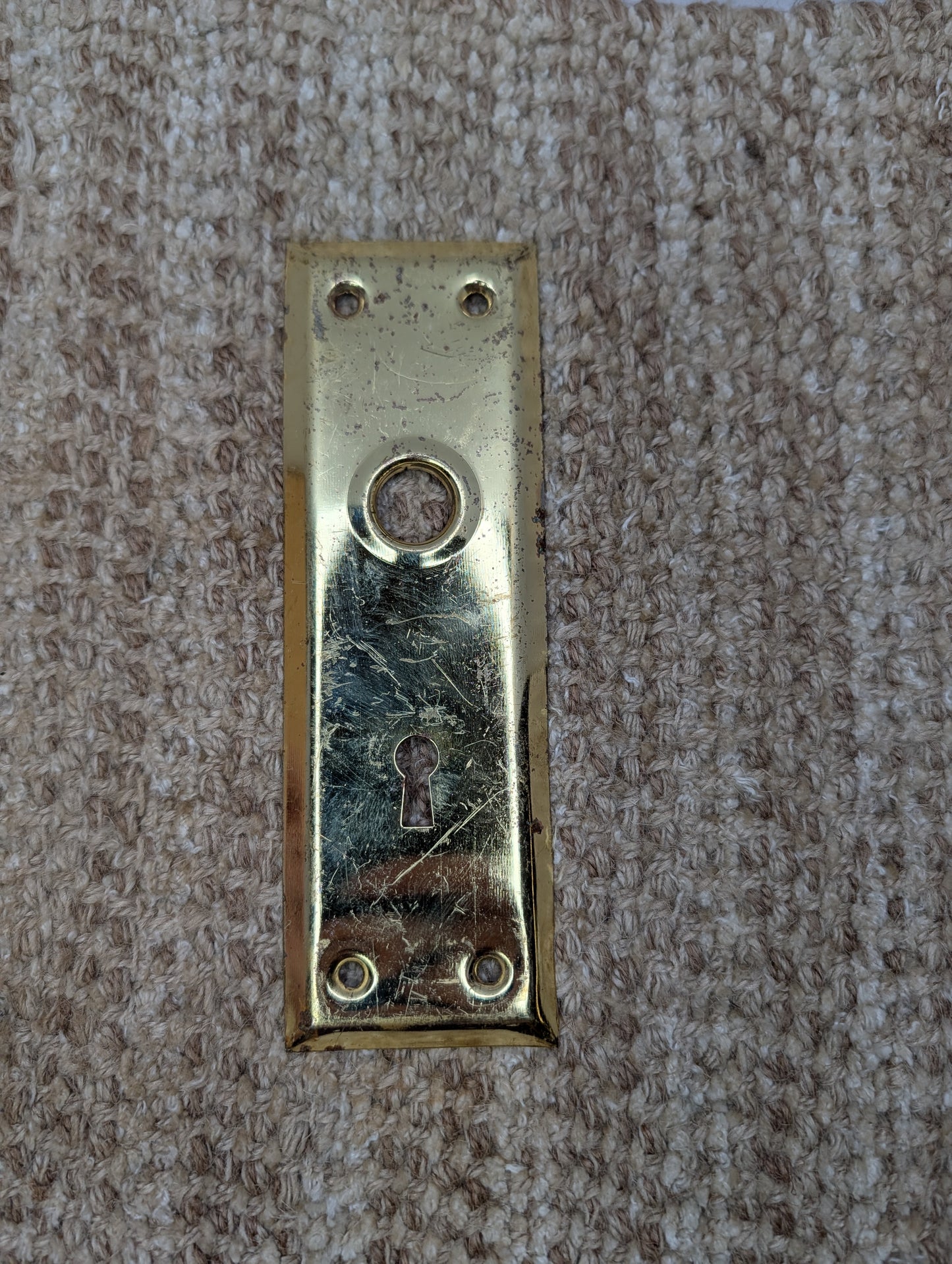 2 1/4" x 7 1/16" Antique Brass Plated Steel Door Knob Plate