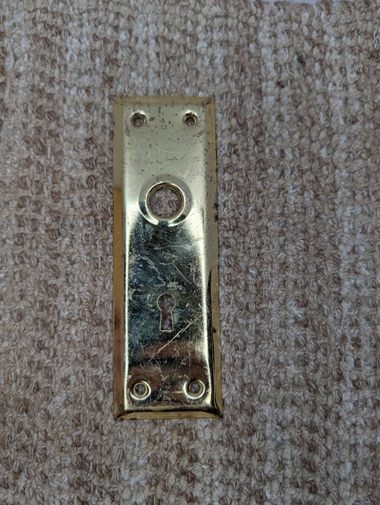 2 1/4" x 7 1/16" Antique Brass Plated Steel Door Knob Plate
