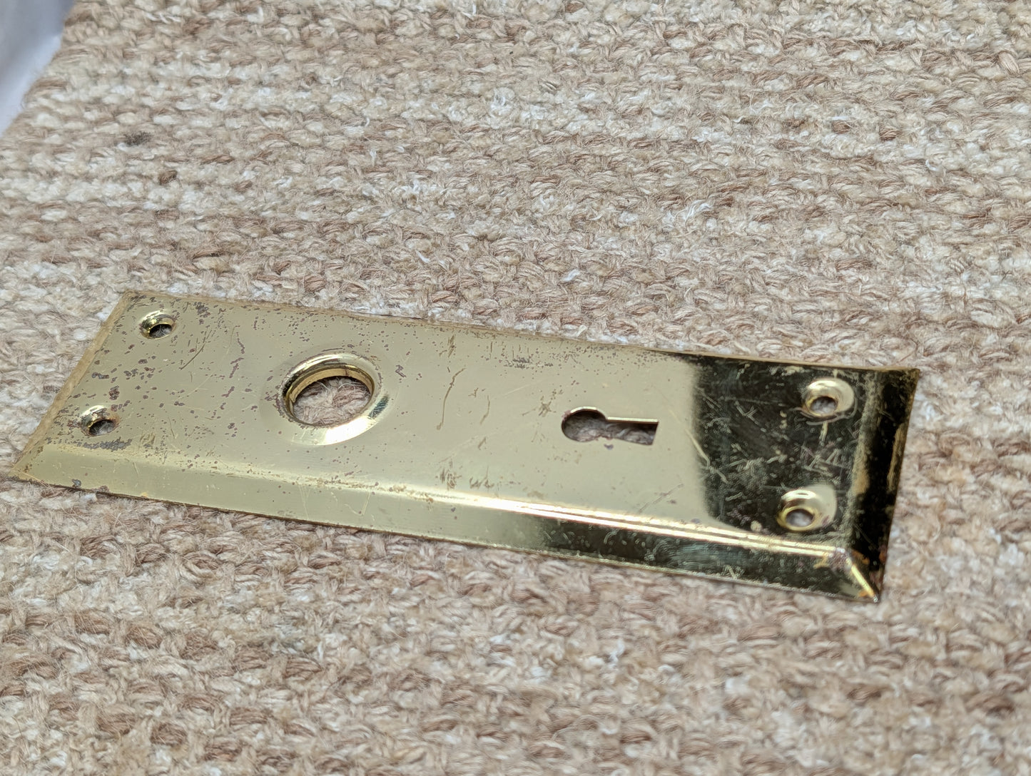 2 1/4" x 7 1/16" Antique Brass Plated Steel Door Knob Plate