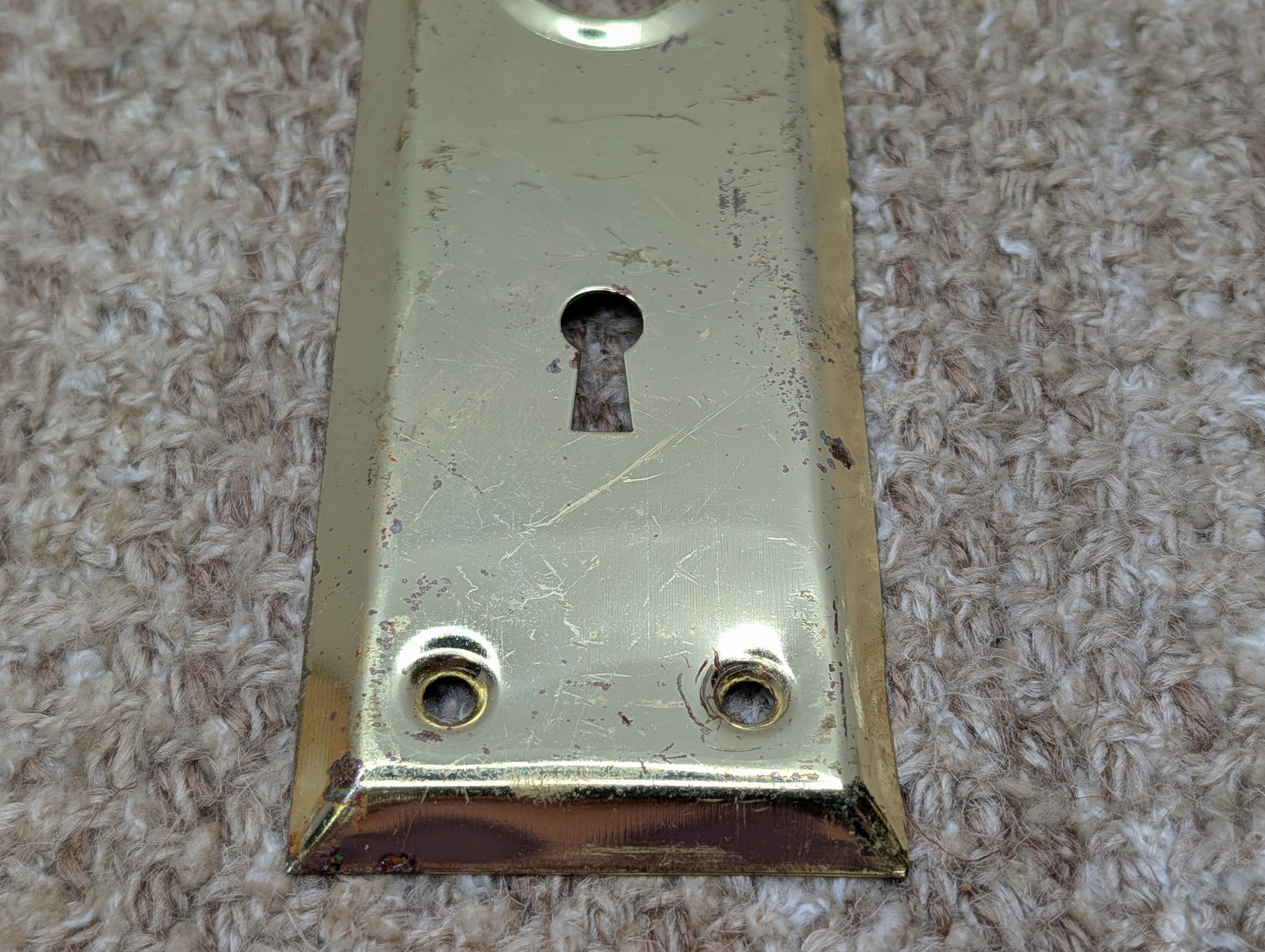 2 1/4" x 7 1/16" Antique Brass Plated Steel Door Knob Plate