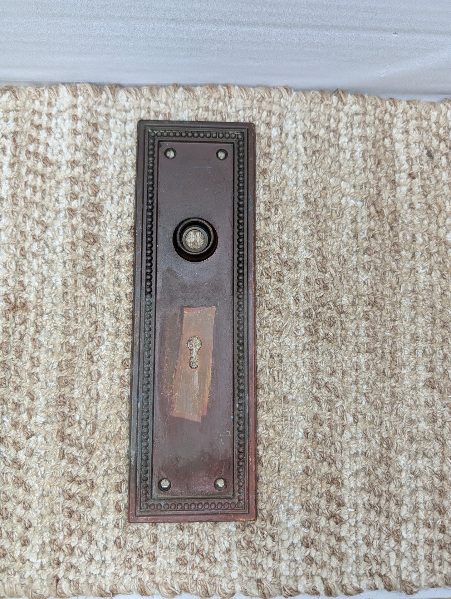 3 1/16" x 9 7/8" Antique Stamped Brass Door Knob Plate
