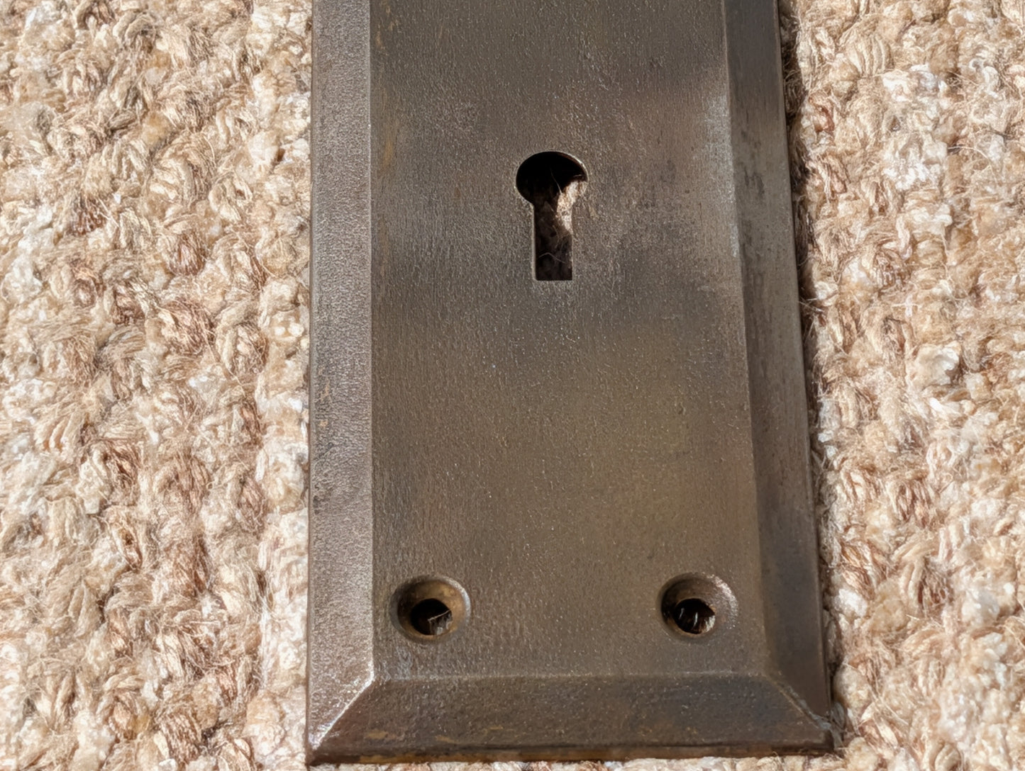 2 1/4" x 7" Antique Stamped Steel Door Knob Plate