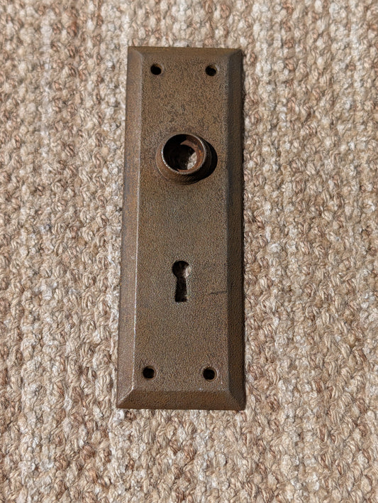 2 1/4" x 7" Antique Stamped Steel Door Knob Plate