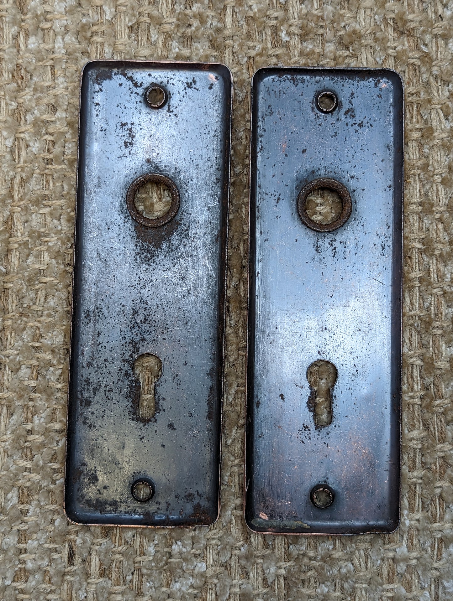 1 15/16" x 5 13/16" Pair Of Antique Stamped Steel Door Knob Plates