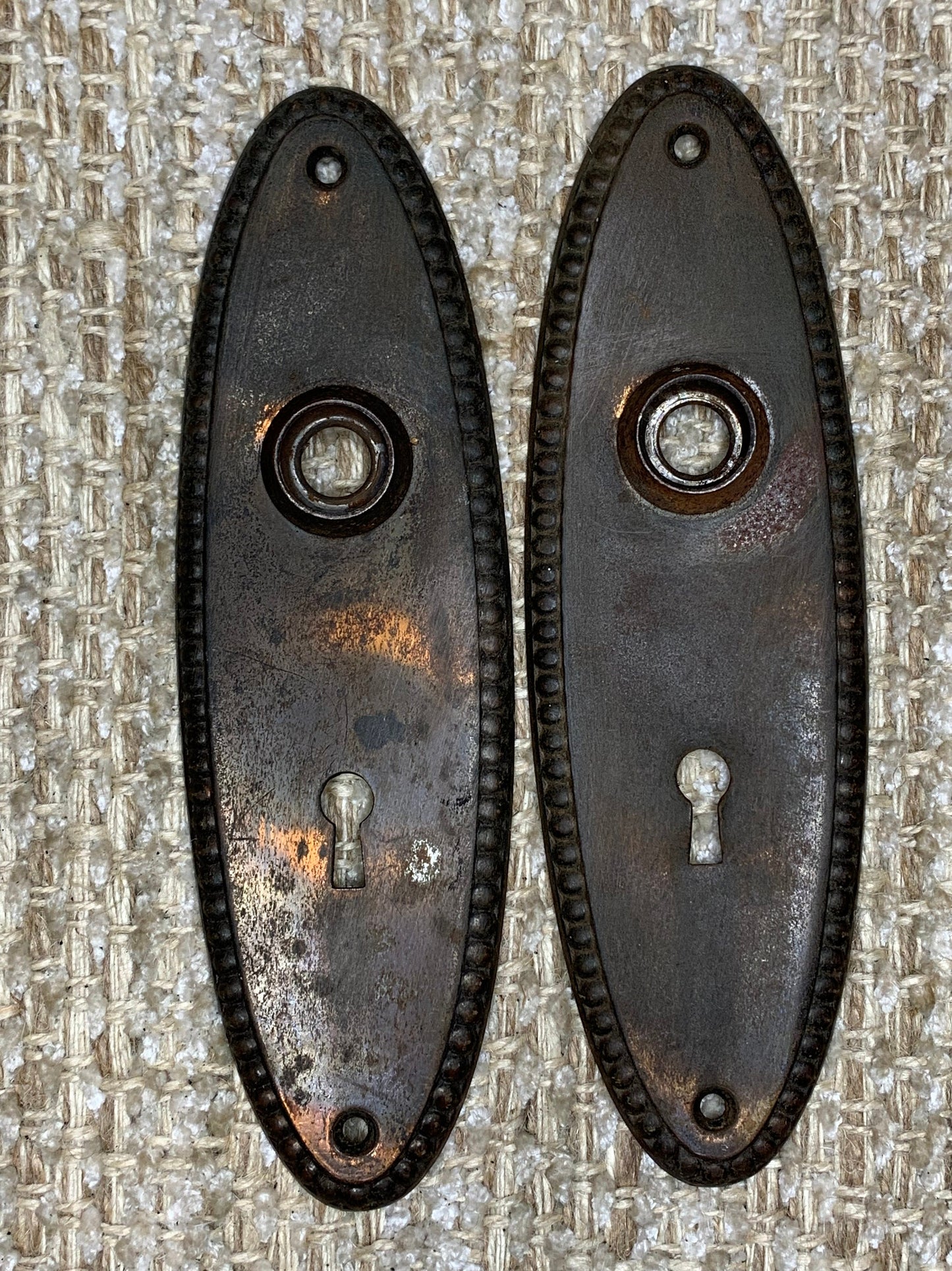 2 1/4" x 7 3/8" Pair Of Antique Stamped Steel Door Knob Plates