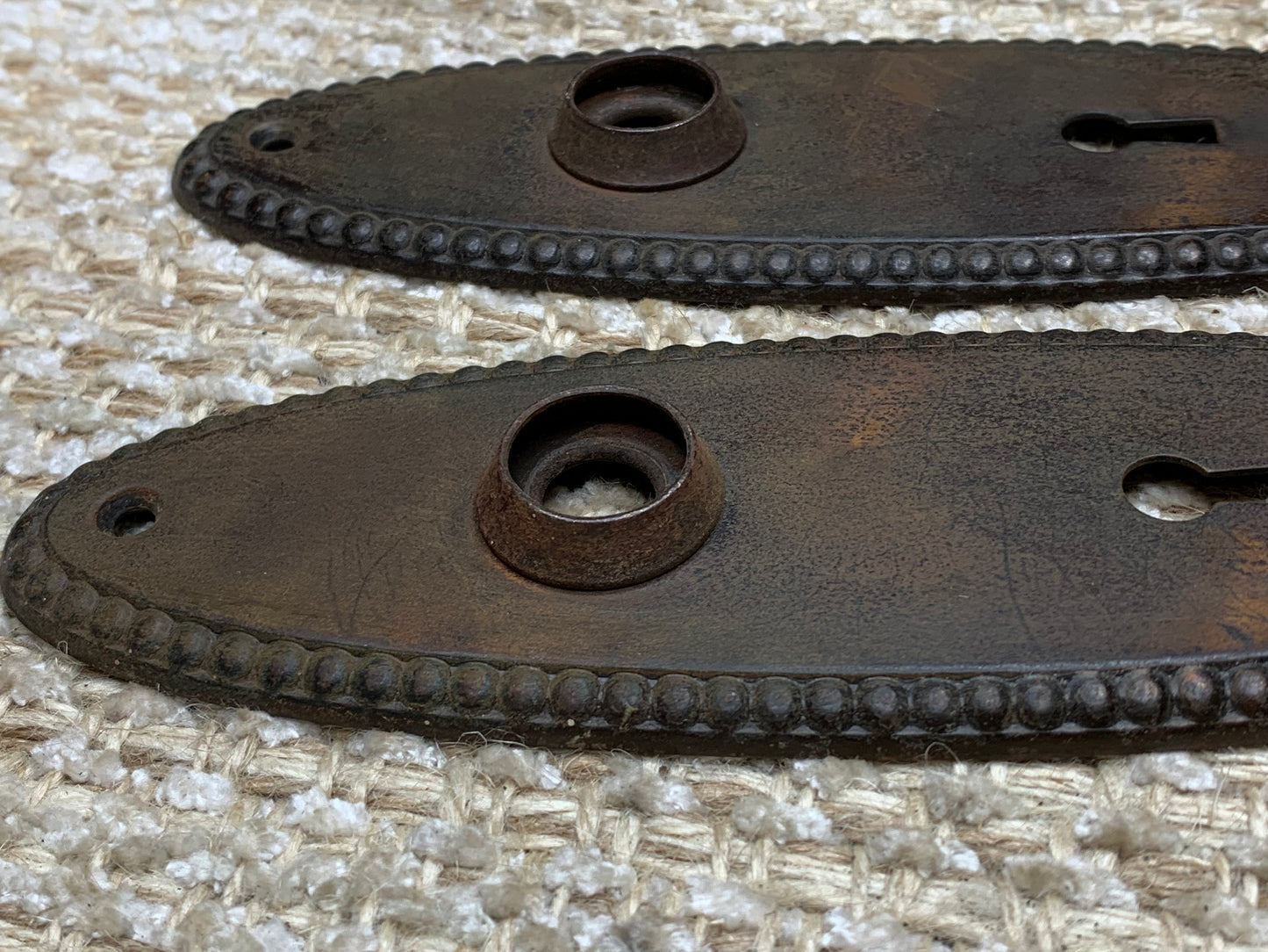 2 1/4" x 7 3/8" Pair Of Antique Stamped Steel Door Knob Plates